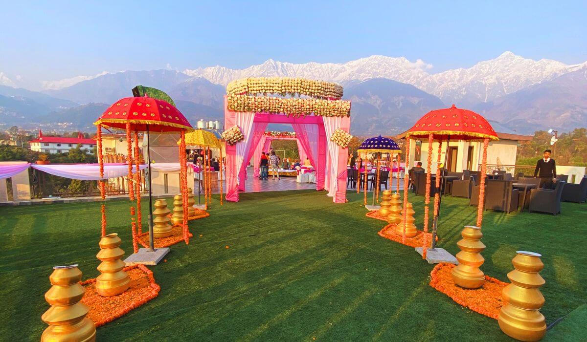 Romantic couple embraces amidst the breathtaking landscapes of Dharamshala, the perfect backdrop for their dream destination weddings in Dharamshala.