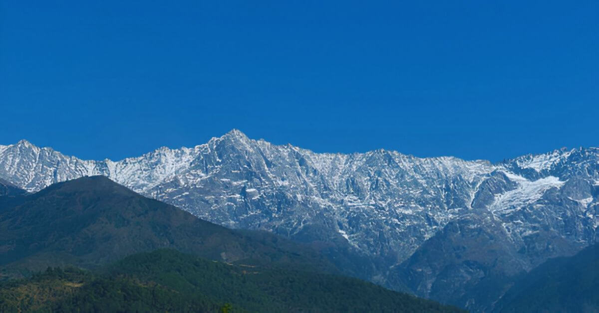 Experience the serene beauty of Dharamshala in February – where snow-capped mountains and crisp air create a perfect winter retreat!